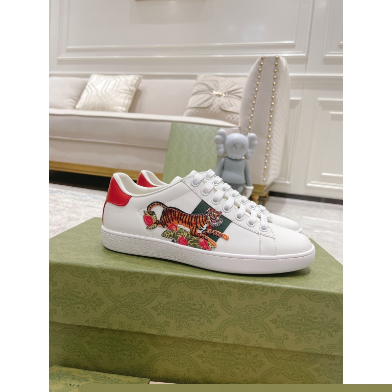 G*u*i sneakers